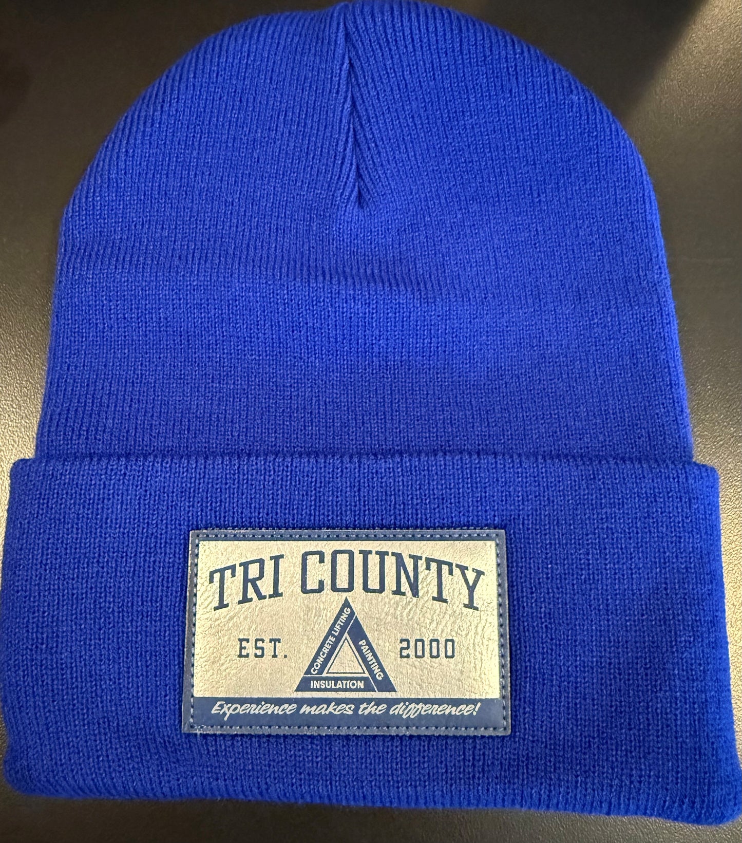 Sherpa lined cuffed beanie with silver patch