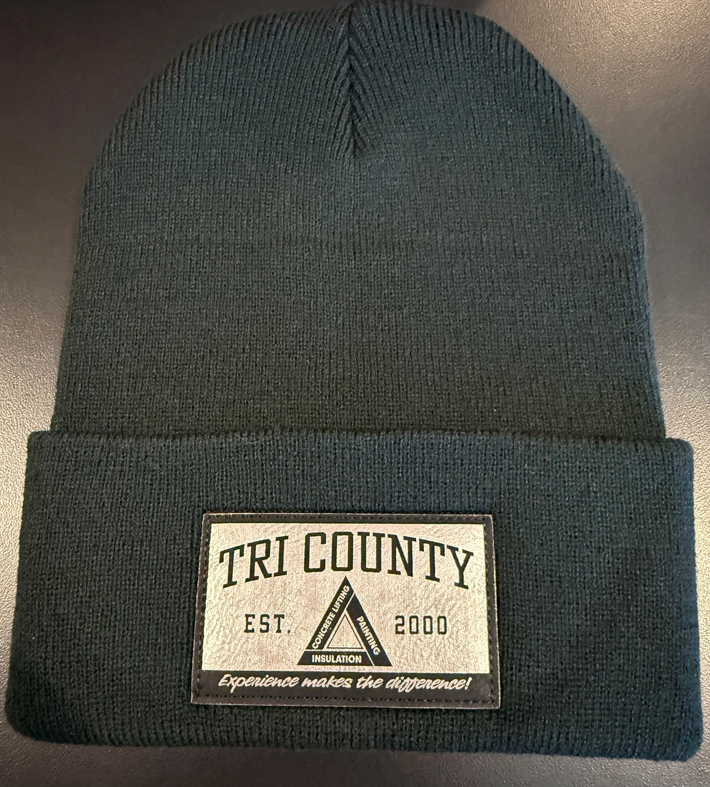 Sherpa lined cuffed beanie with silver patch